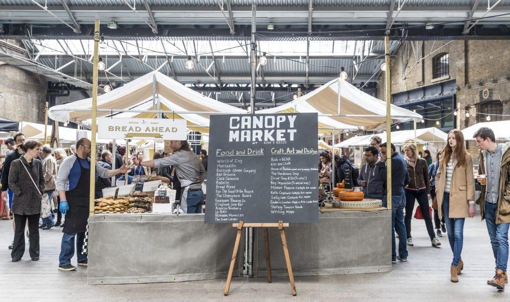 People wandering around Canopy Market in King's Cross St Pancras